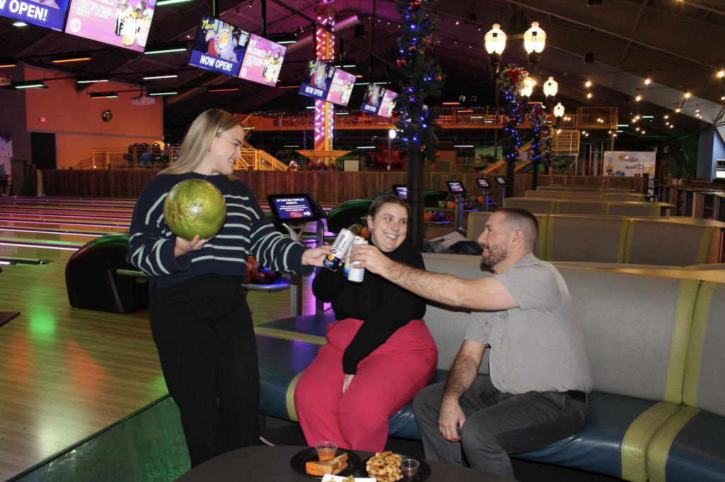 Cheers-ing drinks during the Holidays at Bowling, Corporate